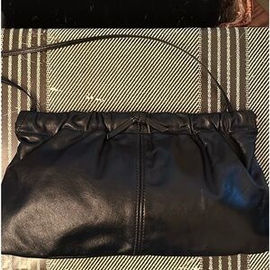 1980s black leather clutch